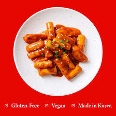 Wang pan-fried tteok crisp edge and chewy center for texture contrast