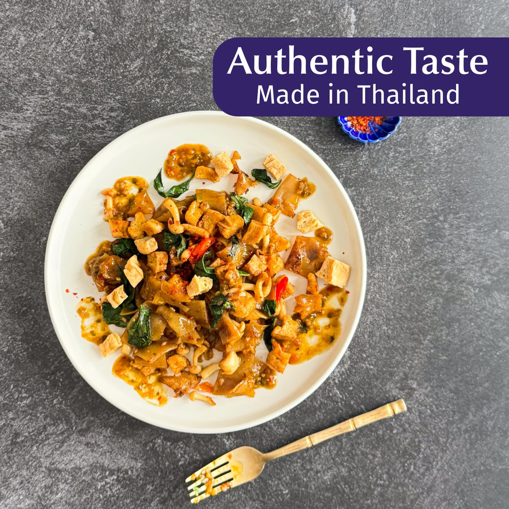 WATCHAREE'S sauce drizzled over steamed rice offering savory finishing boost