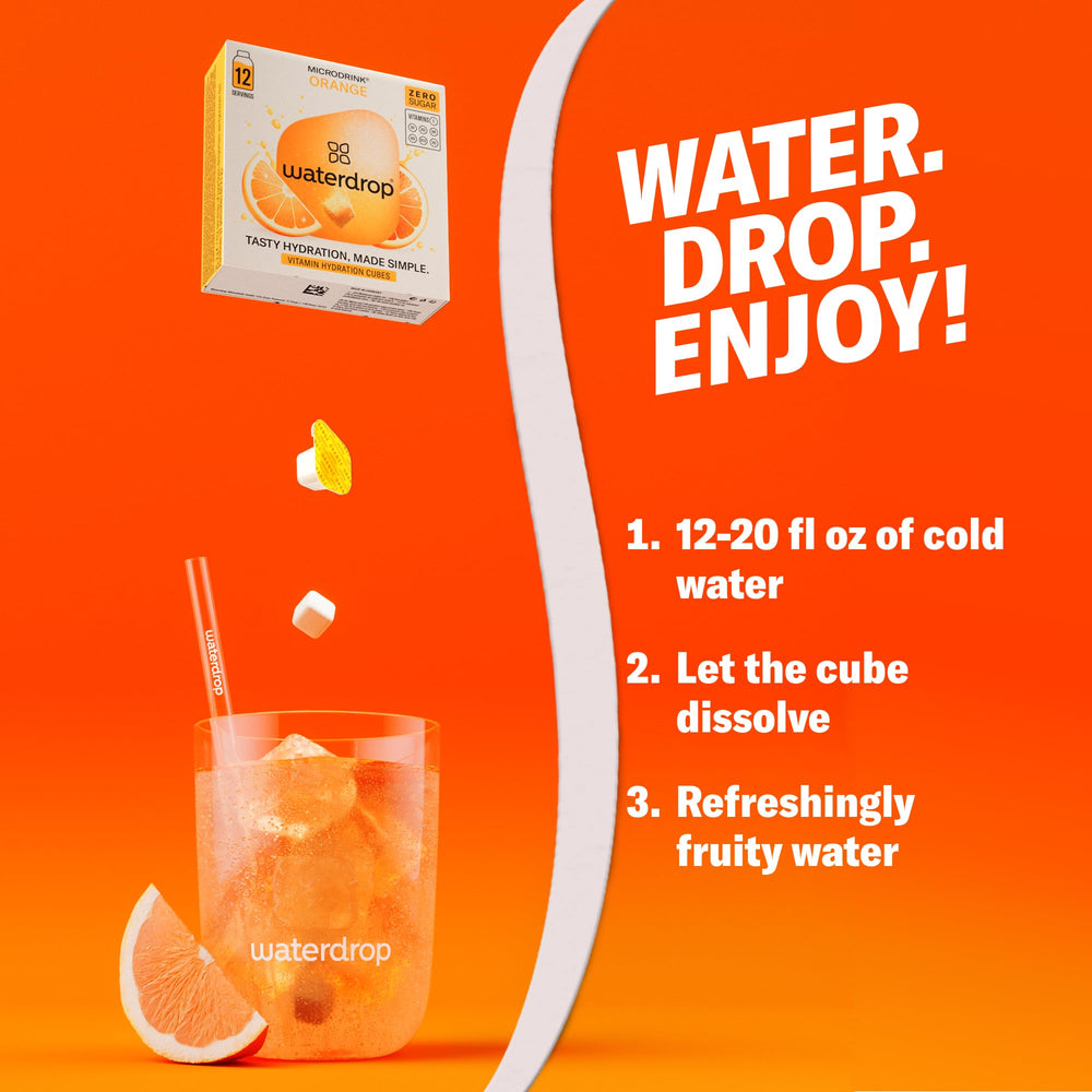 waterdrop MICRODRINK cube next to hand for size comparison and easy dosing