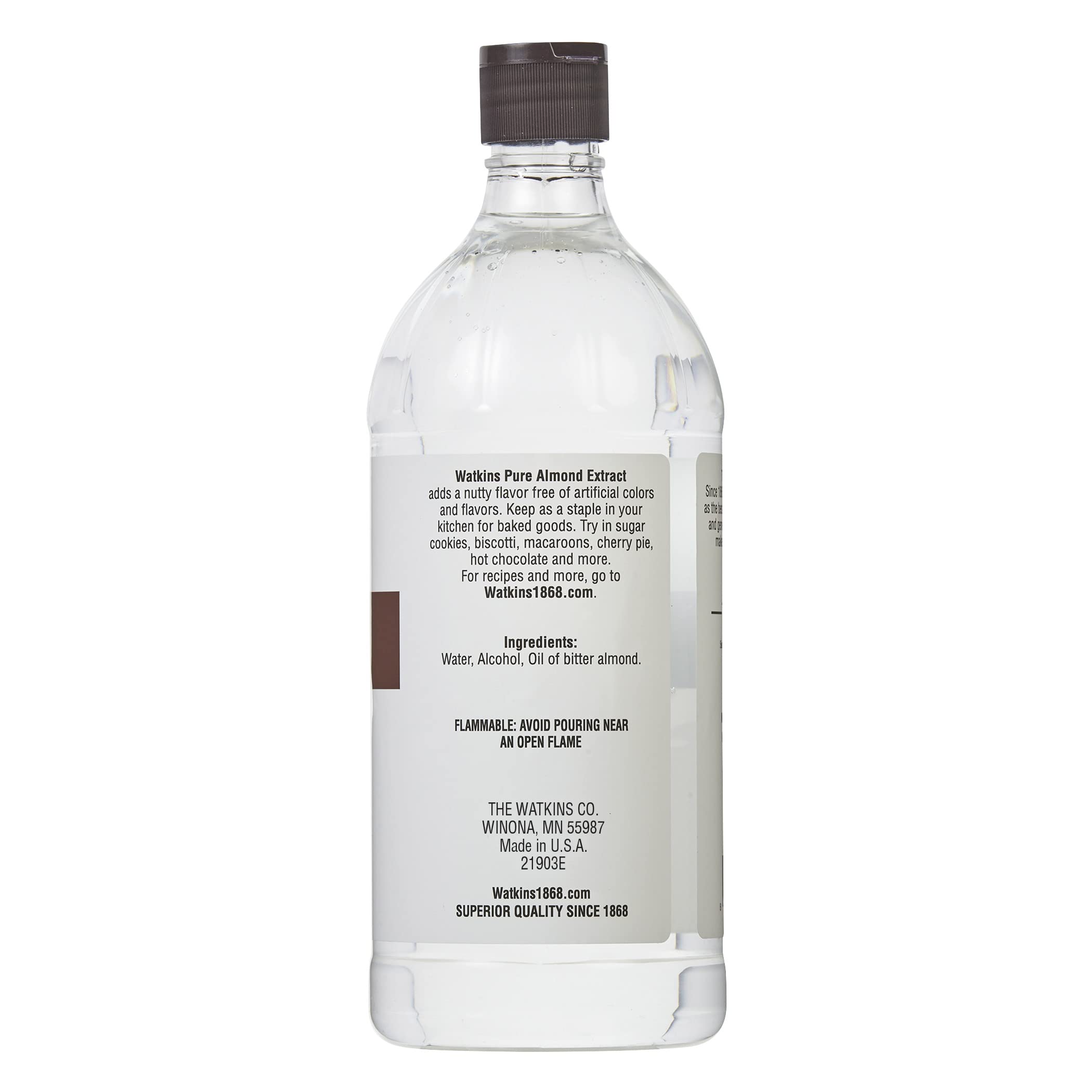 Watkins close-up of amber extract liquid, highlighting pure almond concentration