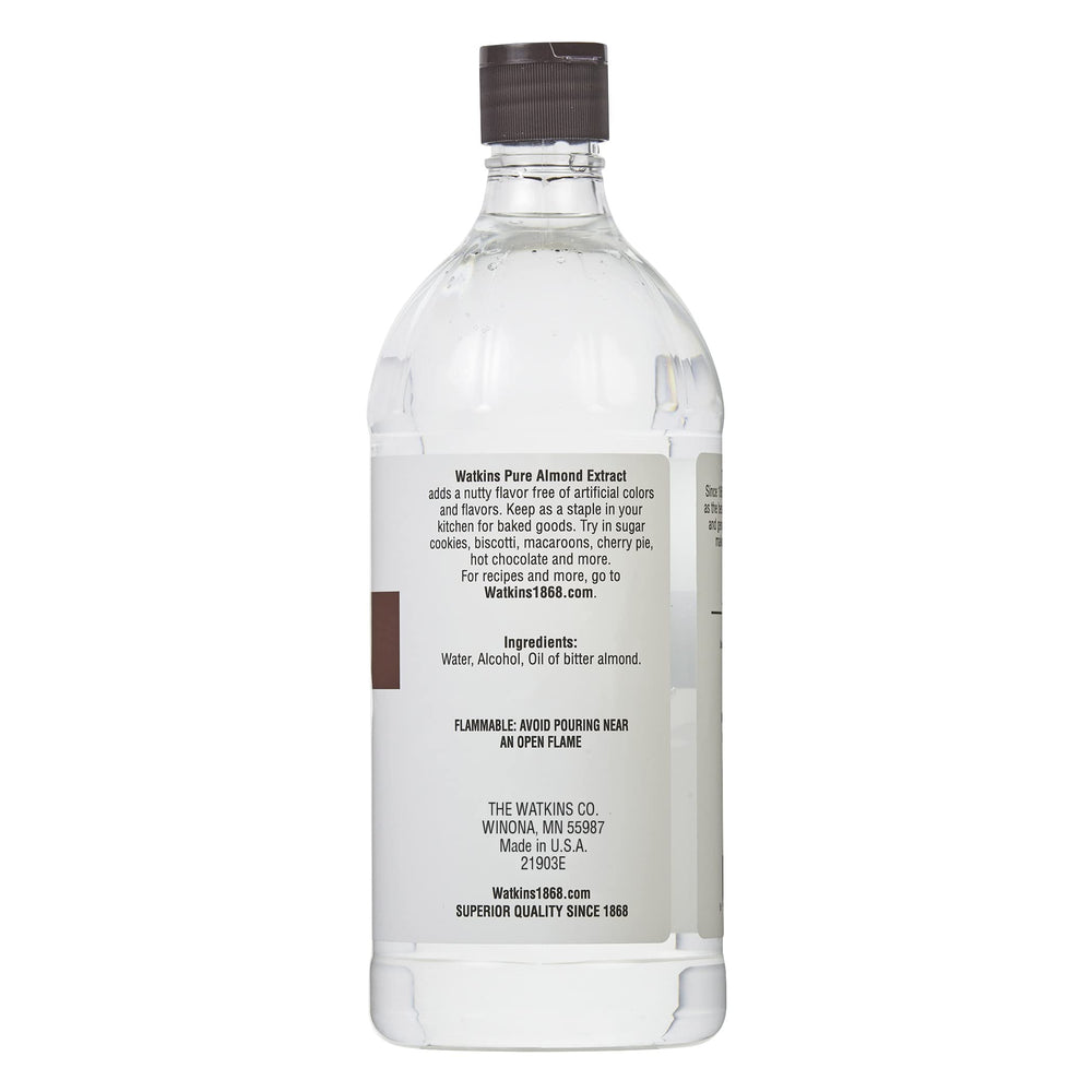 Watkins close-up of amber extract liquid, highlighting pure almond concentration