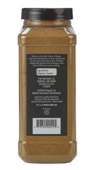 Watkins ground cumin pouring from bottle close-up highlights fine texture and aroma
