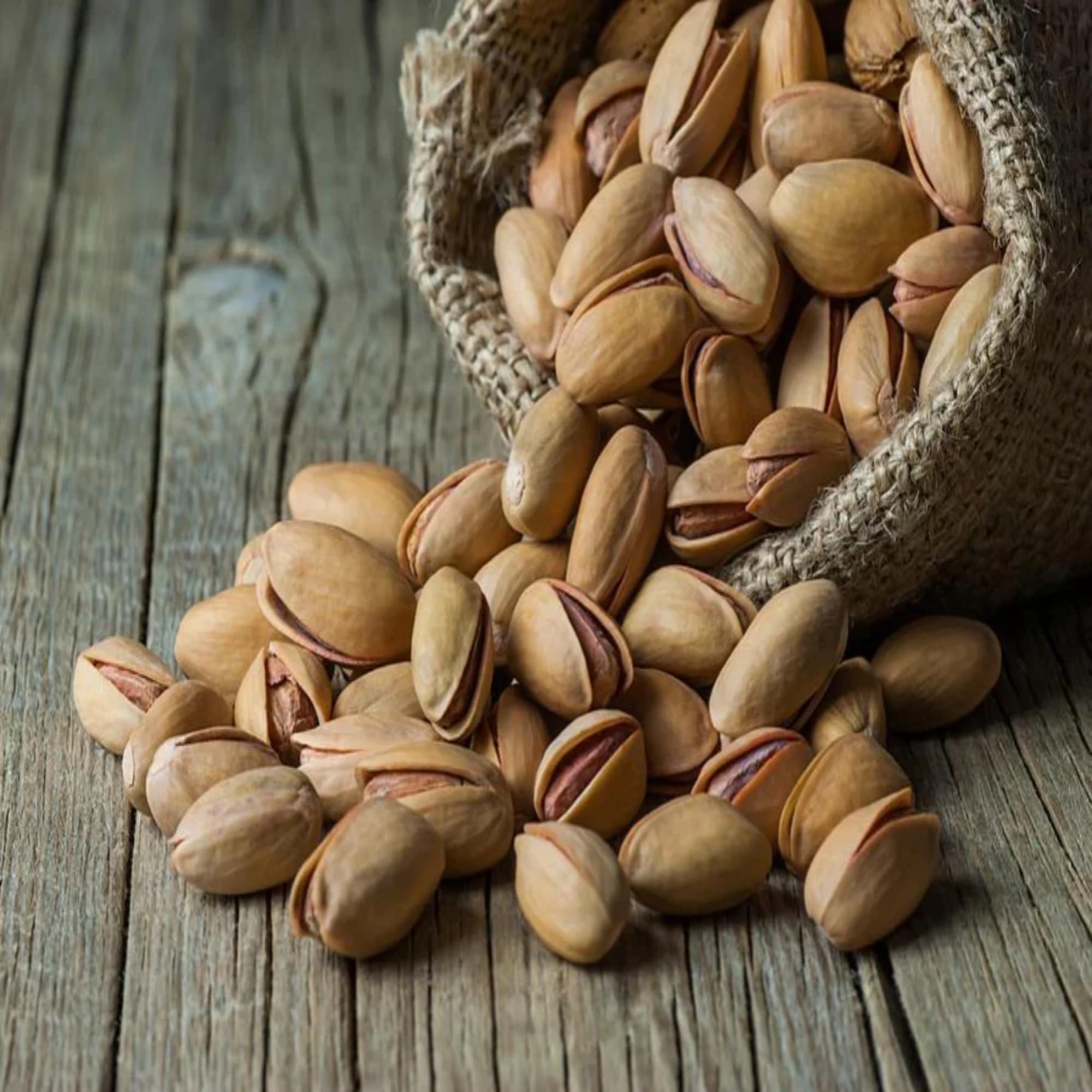 We Got Nuts bowl of pistachios on table for entertaining and sharing