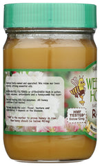 Wee Bee Honey beside a ruler and fruit to show 1 lb jar scale and practical size