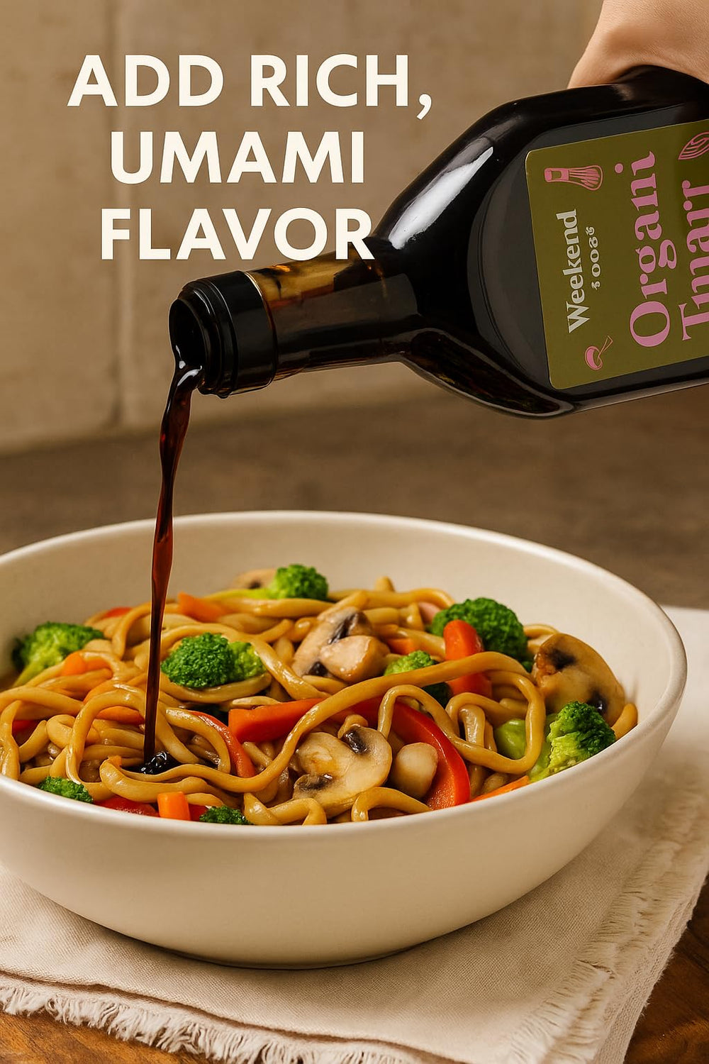 Weekend Foods tamari bottle held in hand to show 16.2 fl oz scale benefit: easy kitchen handling