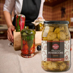 Wellsley Farms open jar top view revealing whole marinated mushrooms for quick serving