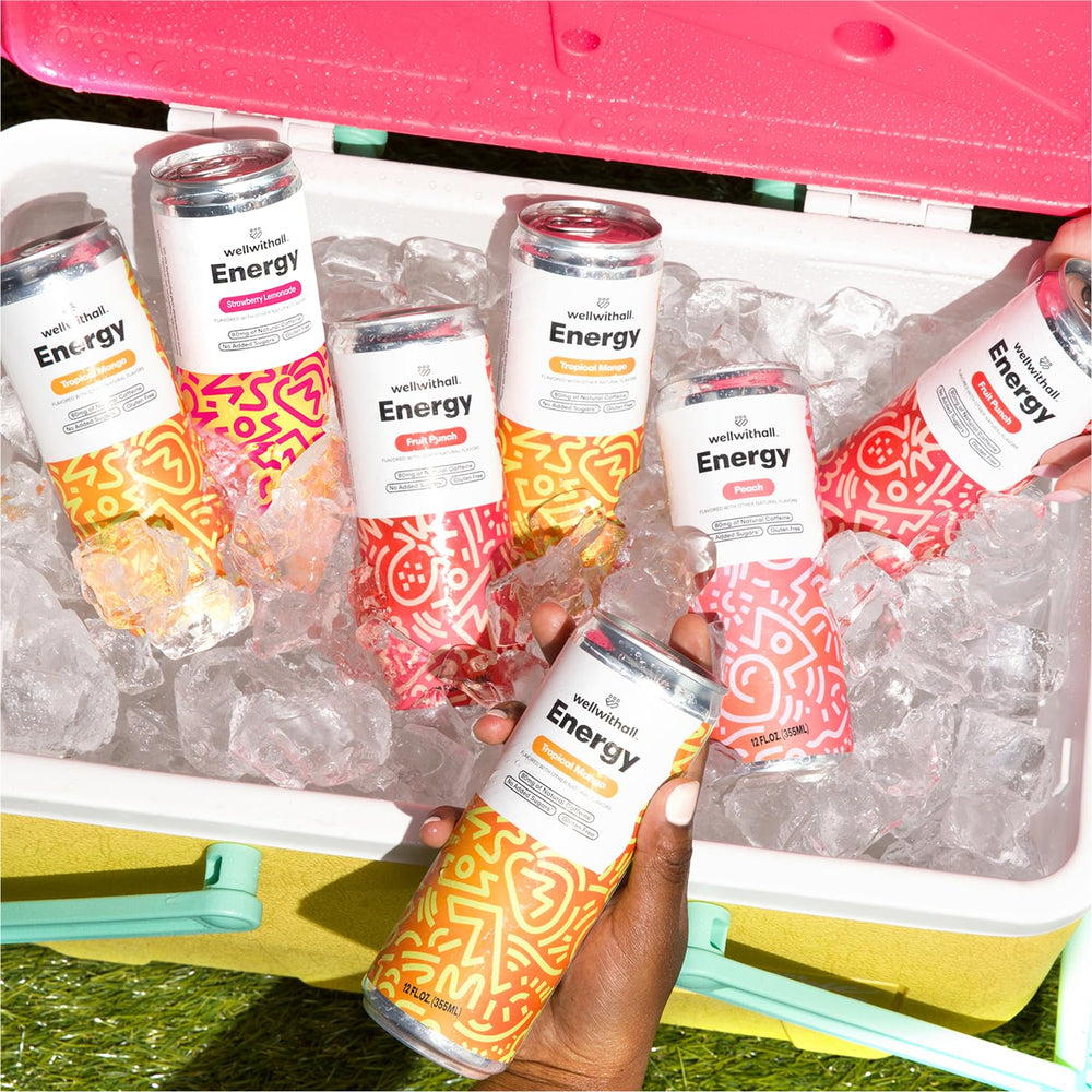 WellWithAll cans on picnic blanket portraying social refreshment and easy sharing
