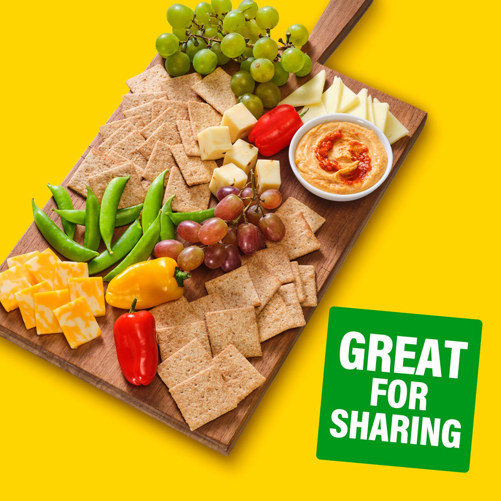 Wheat Thins on a charcuterie tray with meats and fruits for hosting