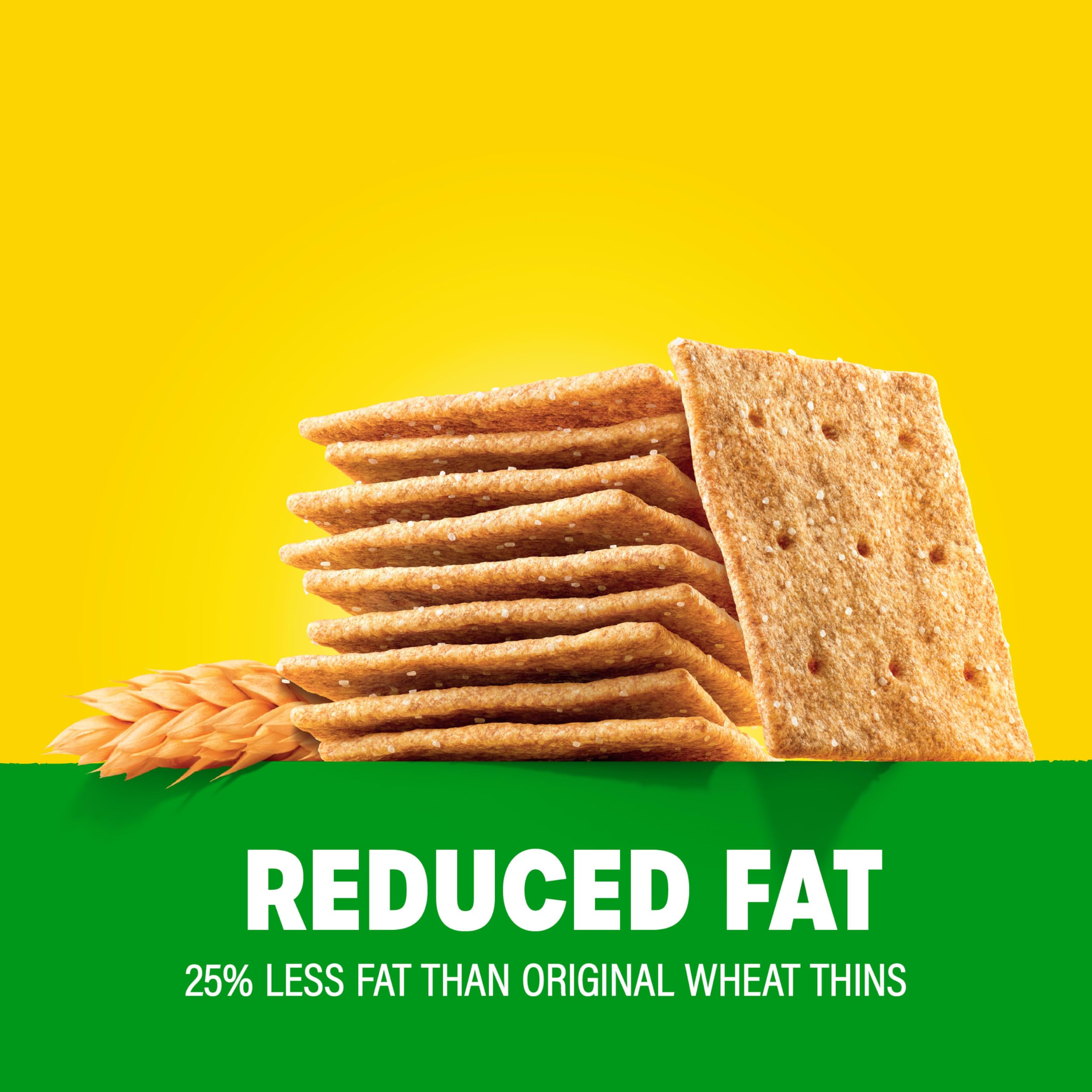 Wheat Thins topped with cheese on a cutting board for pairing ideas
