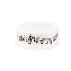 Whimsical Practicality strip being placed on frosted cake demonstrating fast professional finish