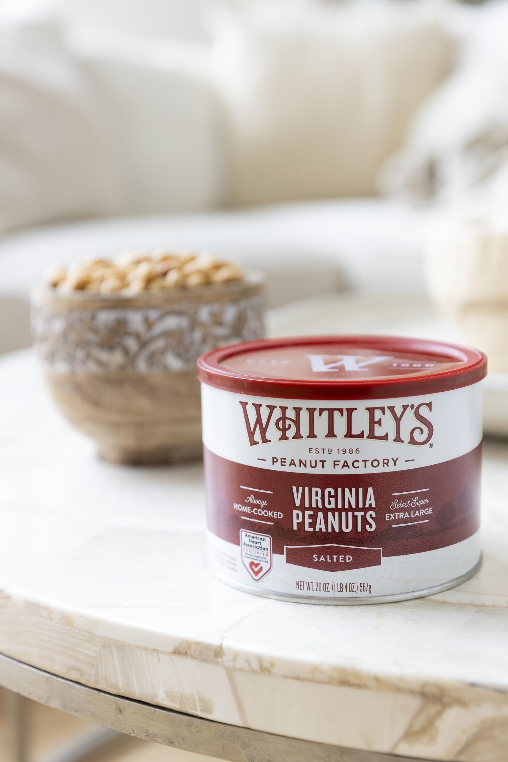 Whitley's open tin showing vacuum seal and preserved freshness benefit