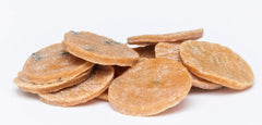 wholeberry single dried passion fruit slice on white plate showing natural color
