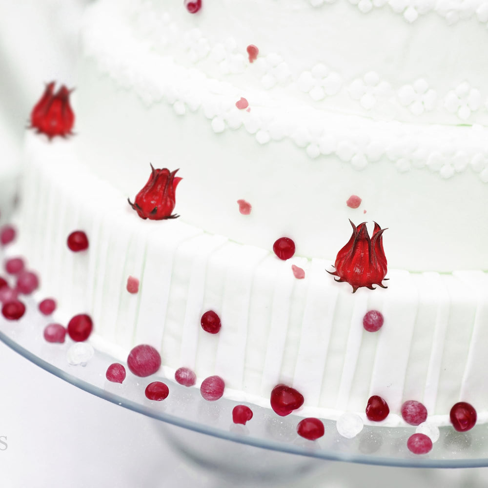 Wild Hibiscus on cheese board styling adds vivid color and texture for entertaining