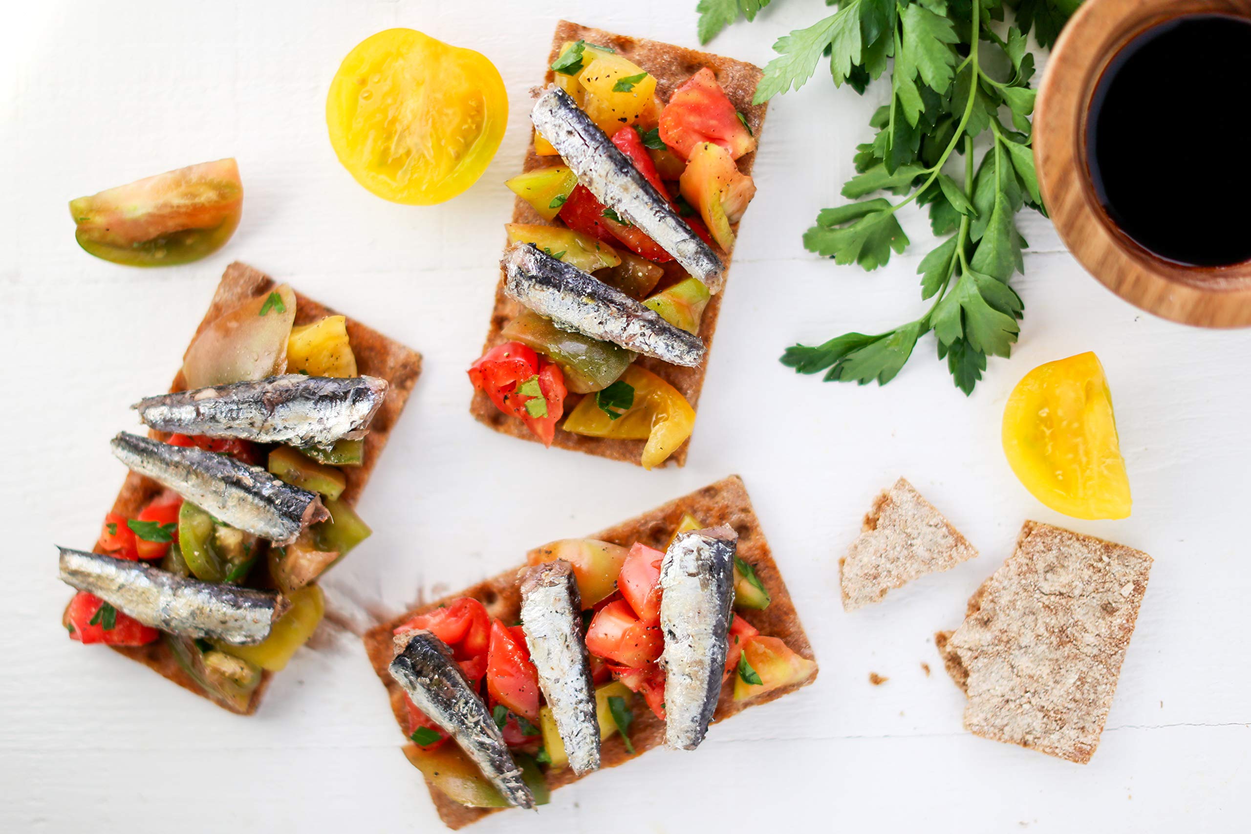 Wild Planet olive oil pour over anchovies showing preserved flavor