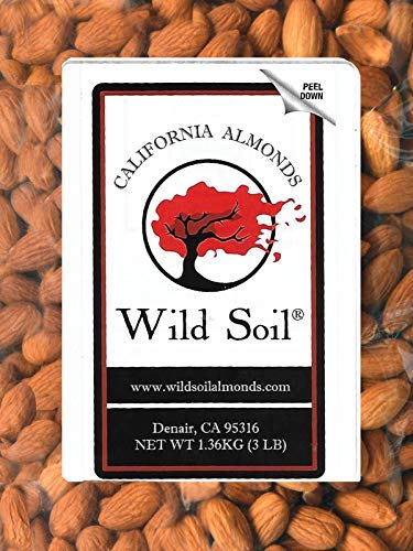 Wild Soil orchard view with biochar‑treated soil, demonstrating eco‑farmed provenance