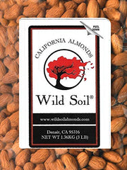 Wild Soil orchard view with biochar‑treated soil, demonstrating eco‑farmed provenance
