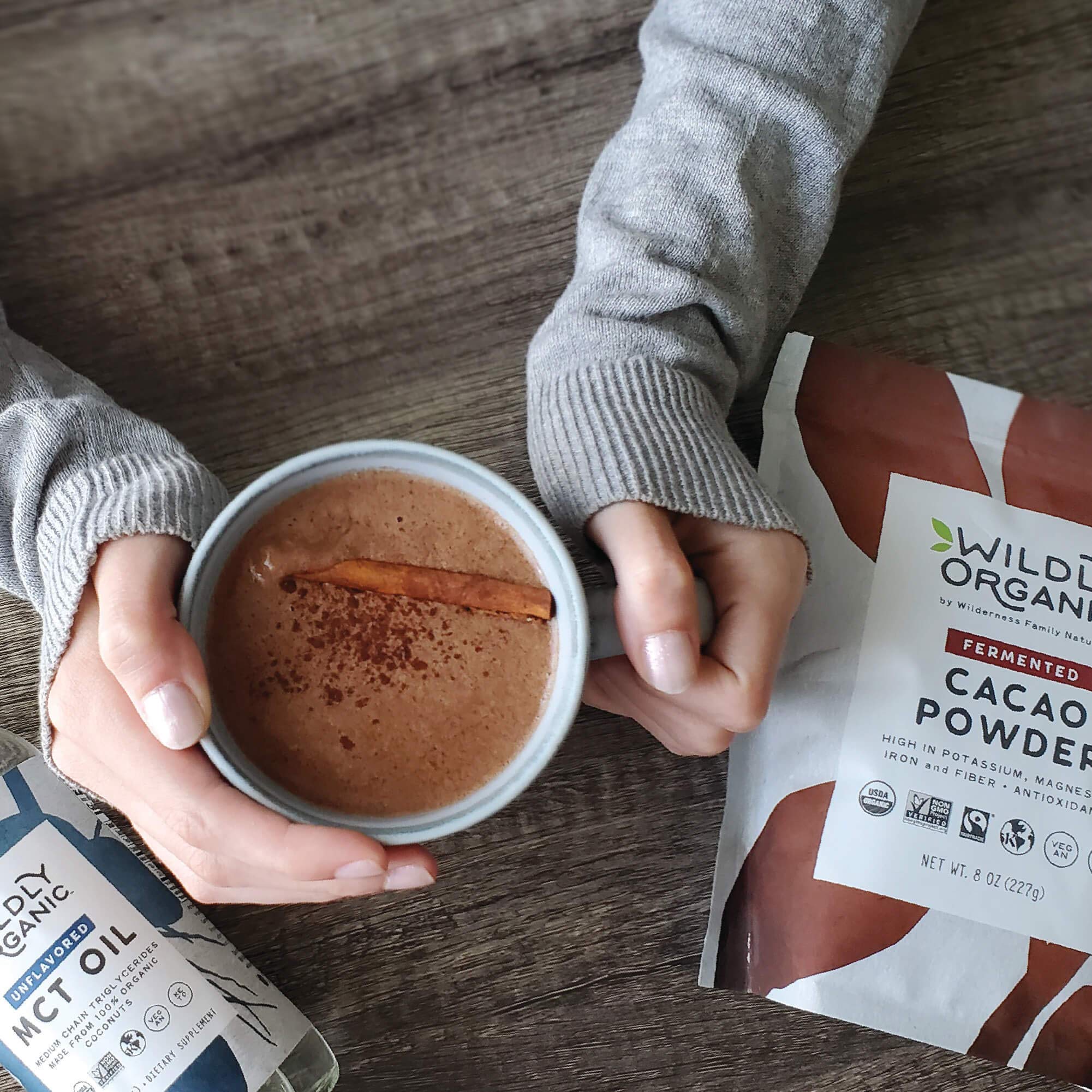 Wildly Organic scoop with powder showing portion size and bulk value benefit