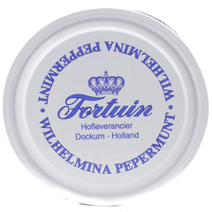 Wilhelmina Fortuin open tin revealing peppermints and reusable storage benefit