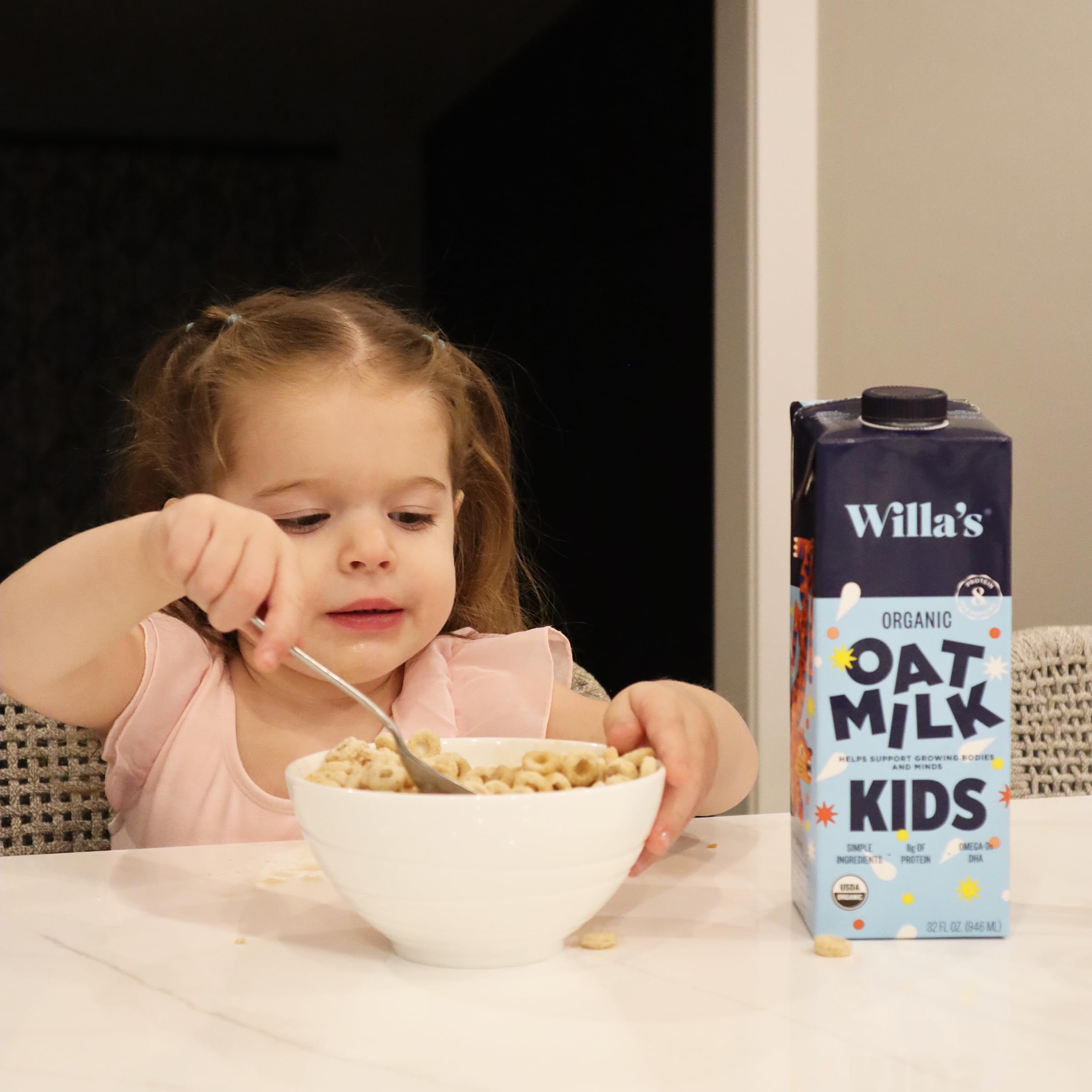 Parents and child enjoying Willa's at the breakfast table together