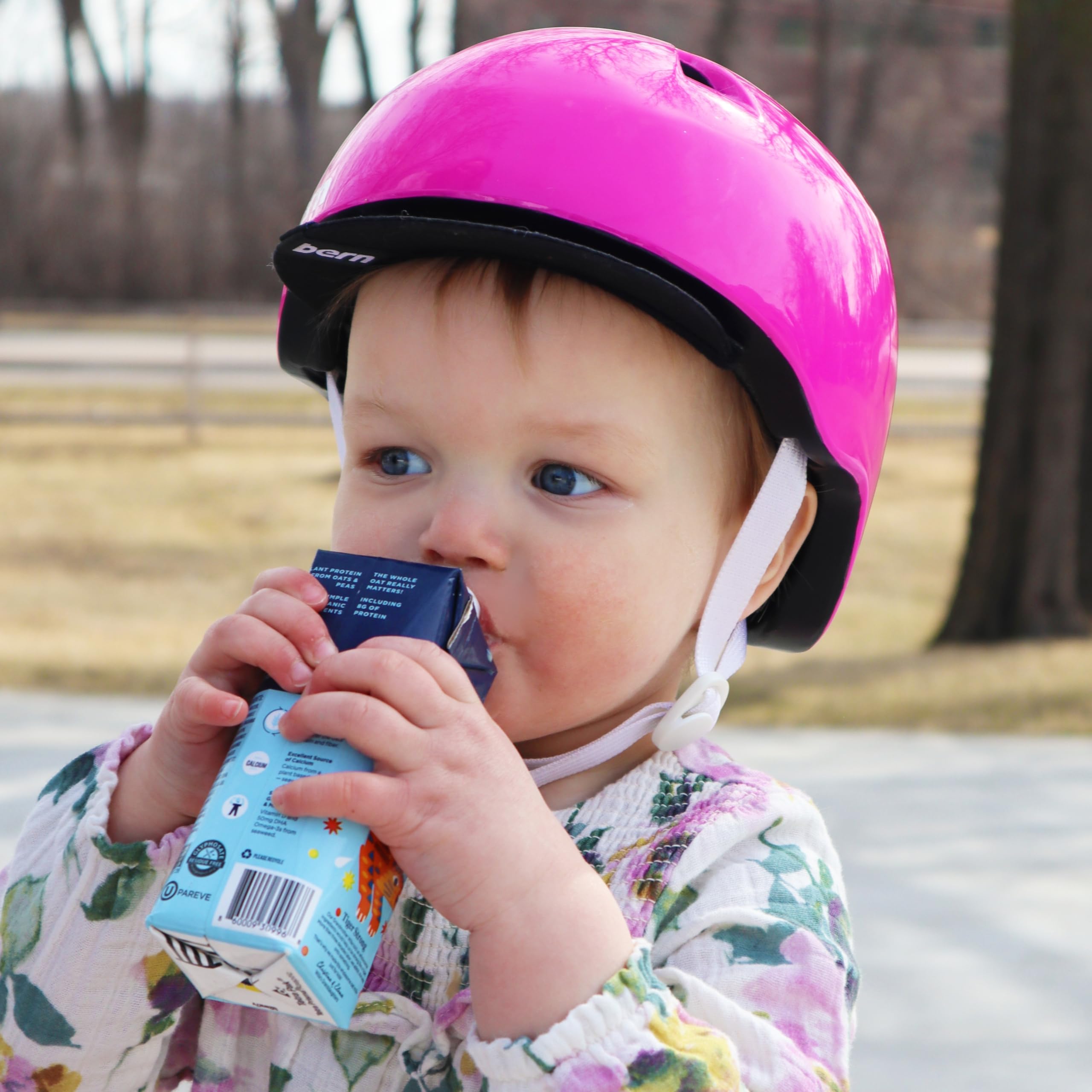 Willa's carton held in hand to show 8.25oz portion size for kids
