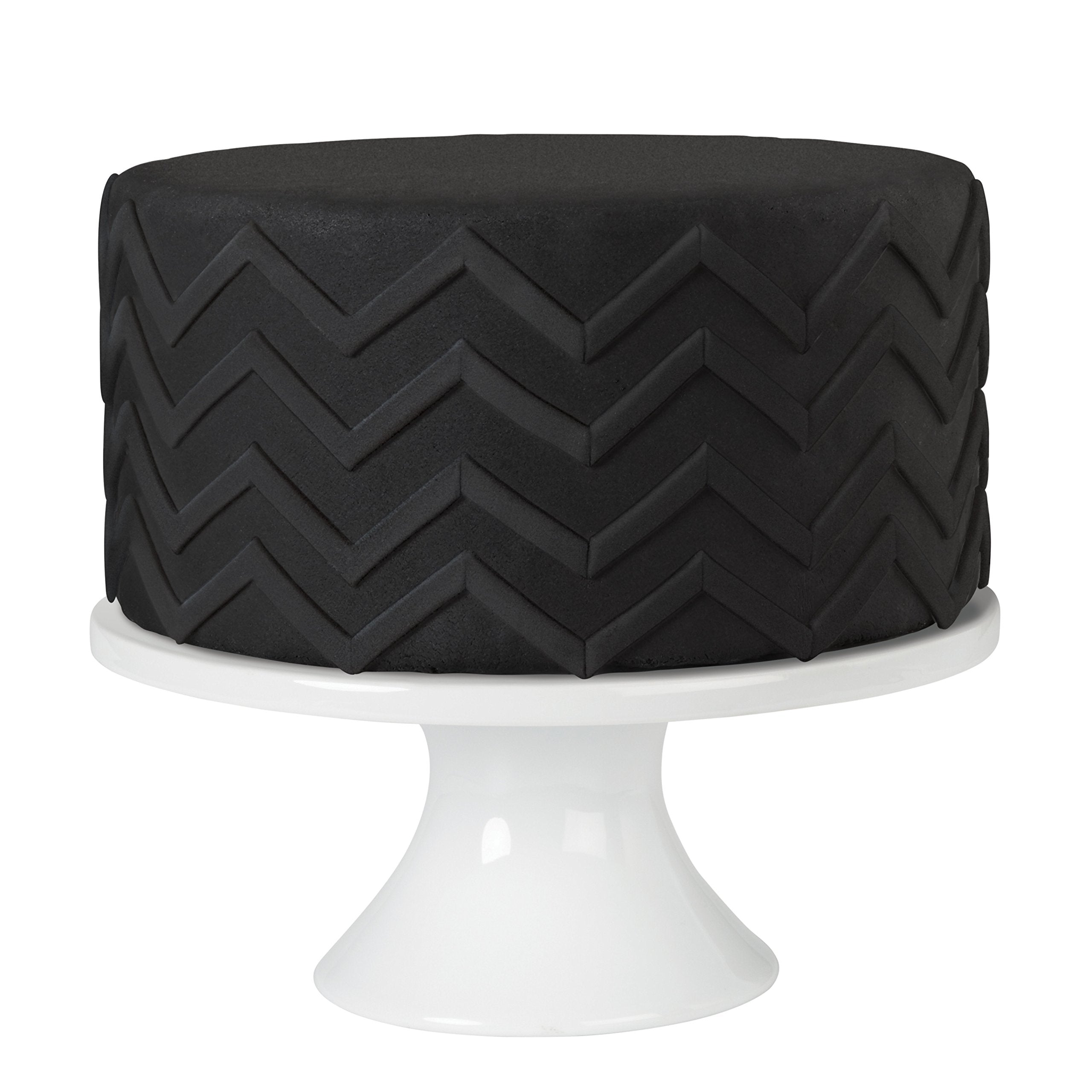 Wilton black fondant texture close-up highlighting smooth, pliable surface for clean drapes