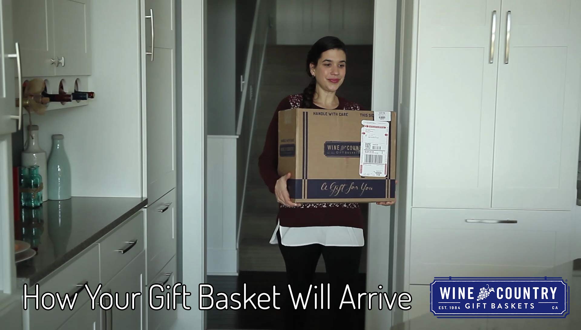 Wine Country Gift Baskets basket size comparison beside a chair showing exact 11 x 7 x 13 inch dimensions