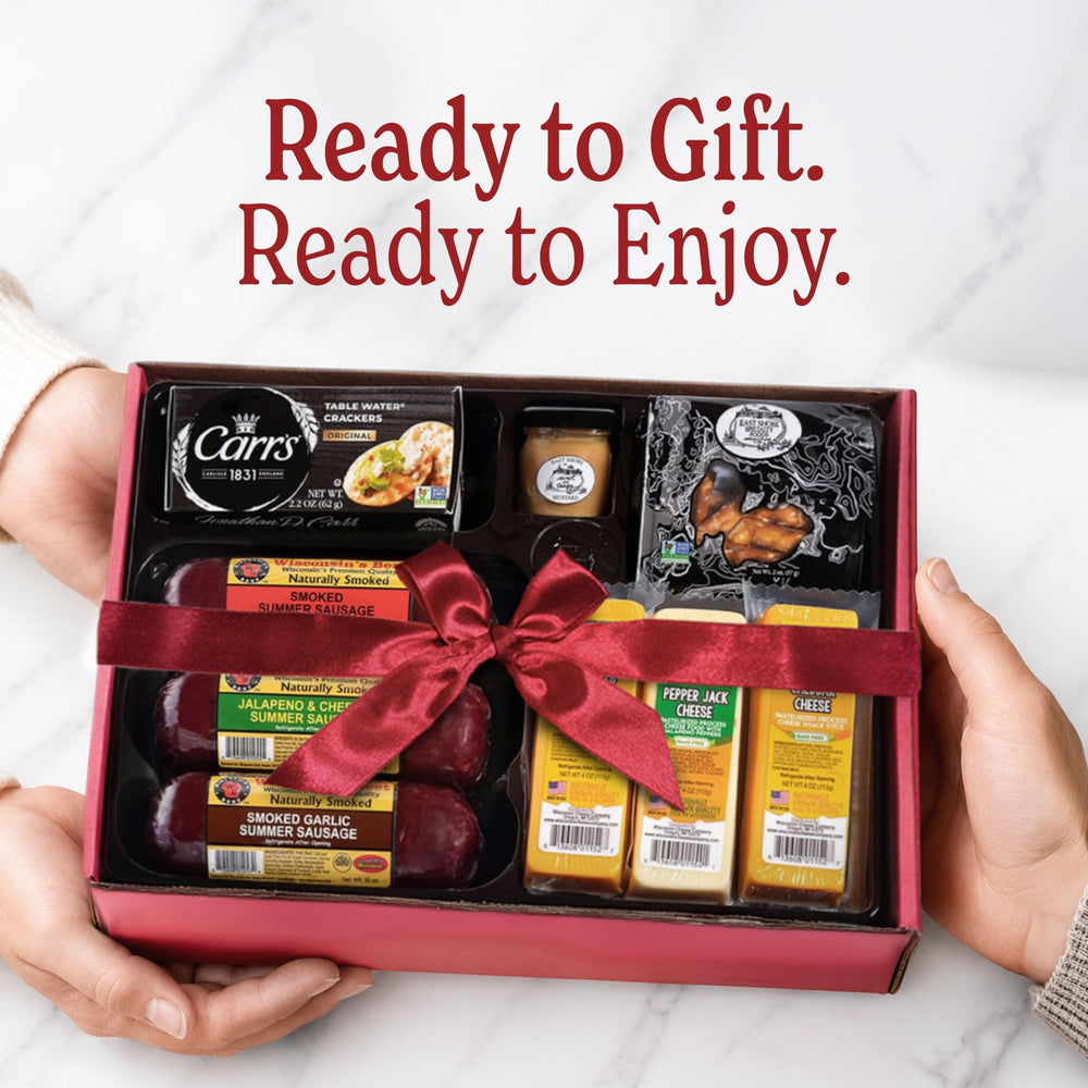 Charcuterie board in use with Wisconsin Cheese Company items creating an elegant appetizer spread