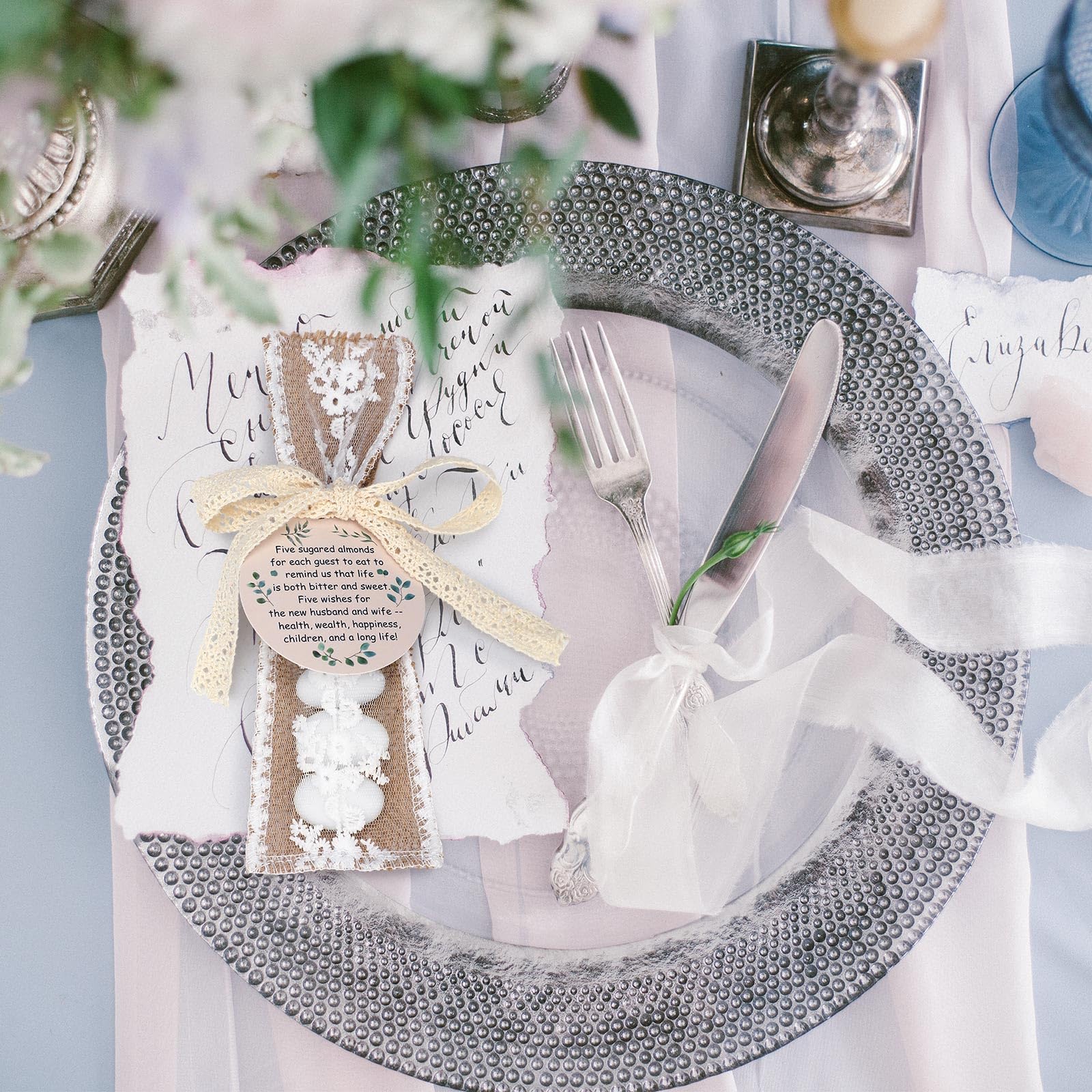 Woanger bags with almonds in use on a reception table demonstrating elegant guest presentation