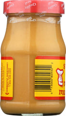 Woeber Mustard Mfg. Co. close-up pouring mustard to show smooth texture and balanced flavor