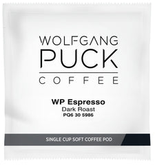 Wolfgang Puck espresso poured into cup illustrating rich crema and body