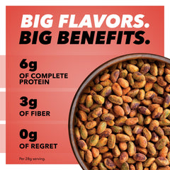 Close-up of chili roasted pistachio kernels showing seasoning texture and bold flavor