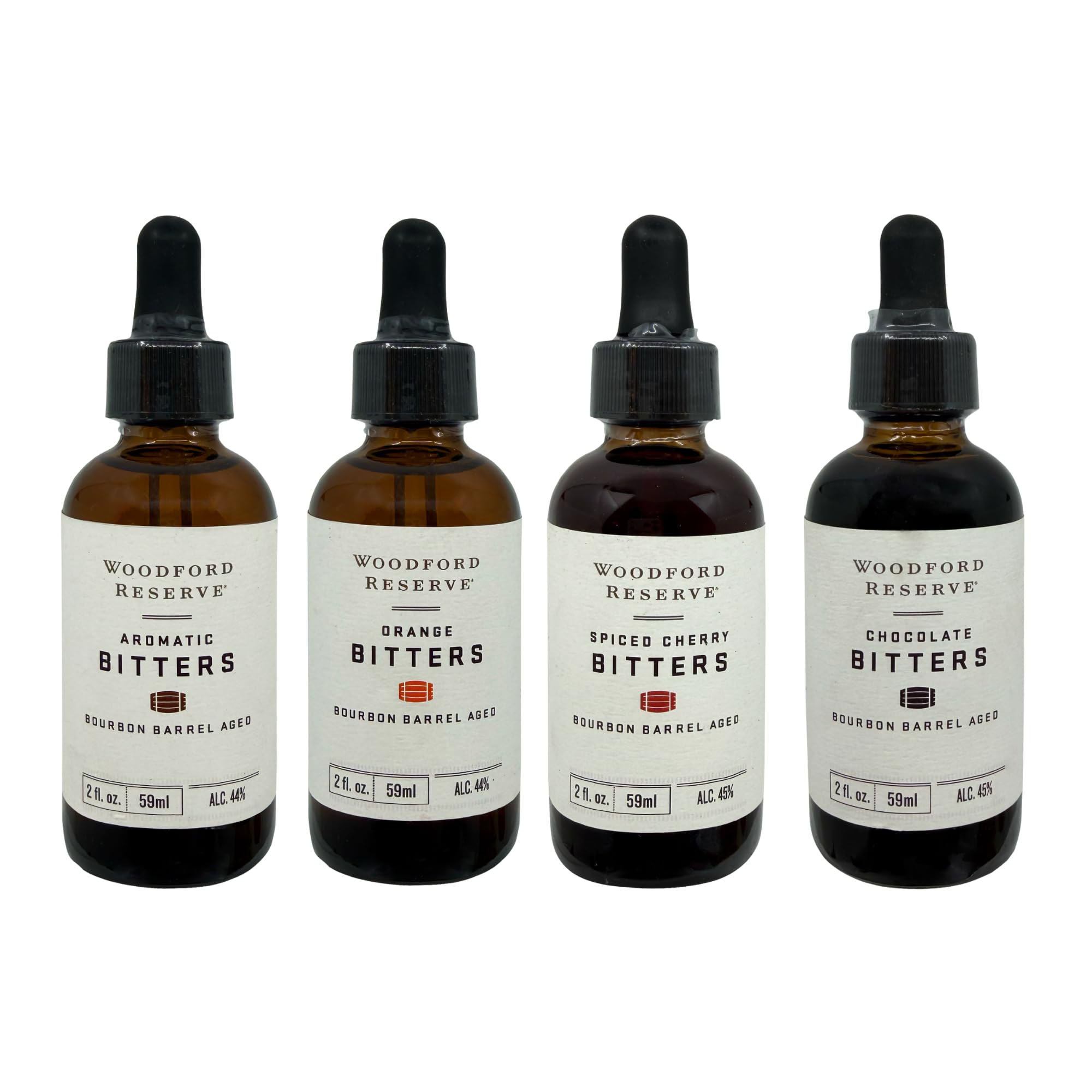 Woodford Reserve bitters front packaging showing four 2 oz bottles and branding benefit mixology versatility