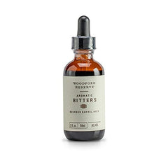 Woodford Reserve aromatic bitters vial front showing label and bourbon-aged benefit