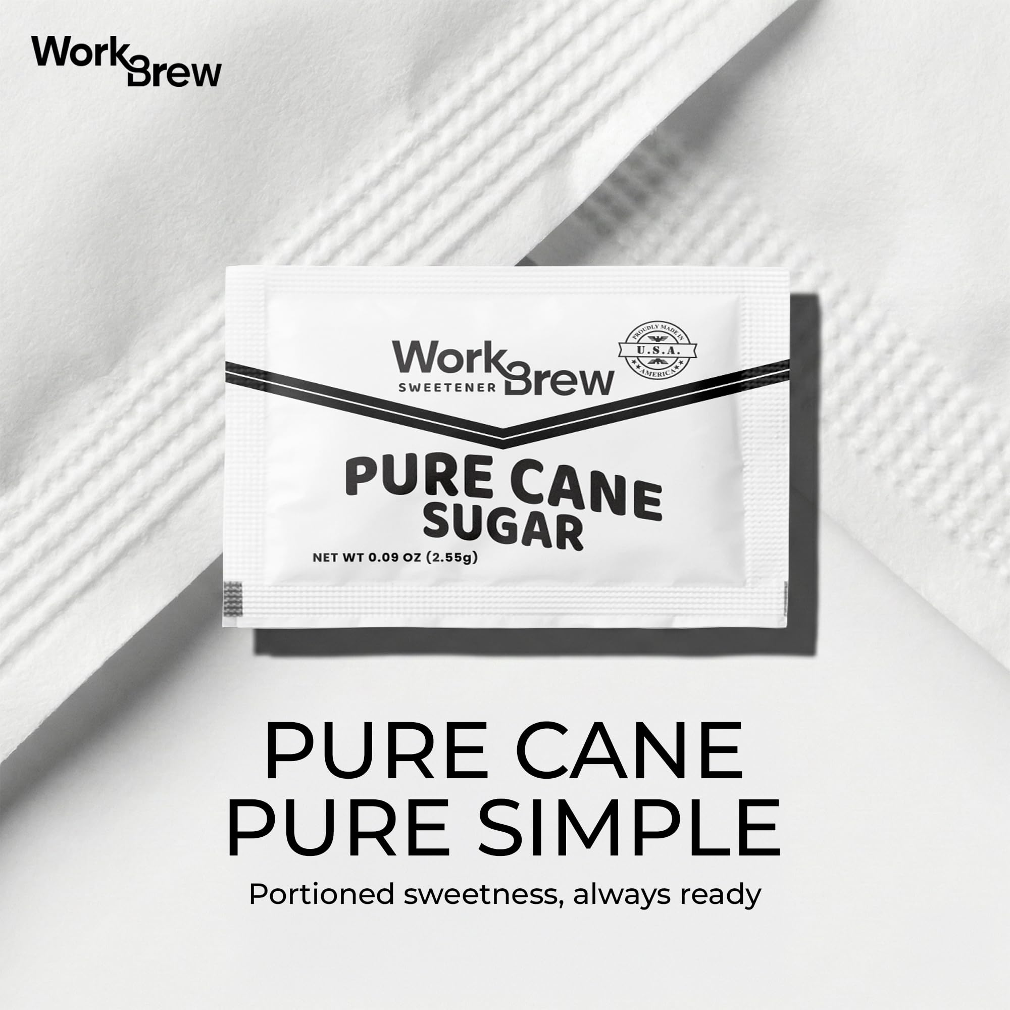 WorkBrew open packet spilling fine white sugar showing quick-dissolve texture advantage