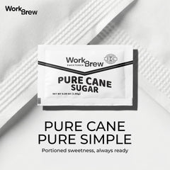 WorkBrew open packet spilling fine white sugar showing quick-dissolve texture advantage
