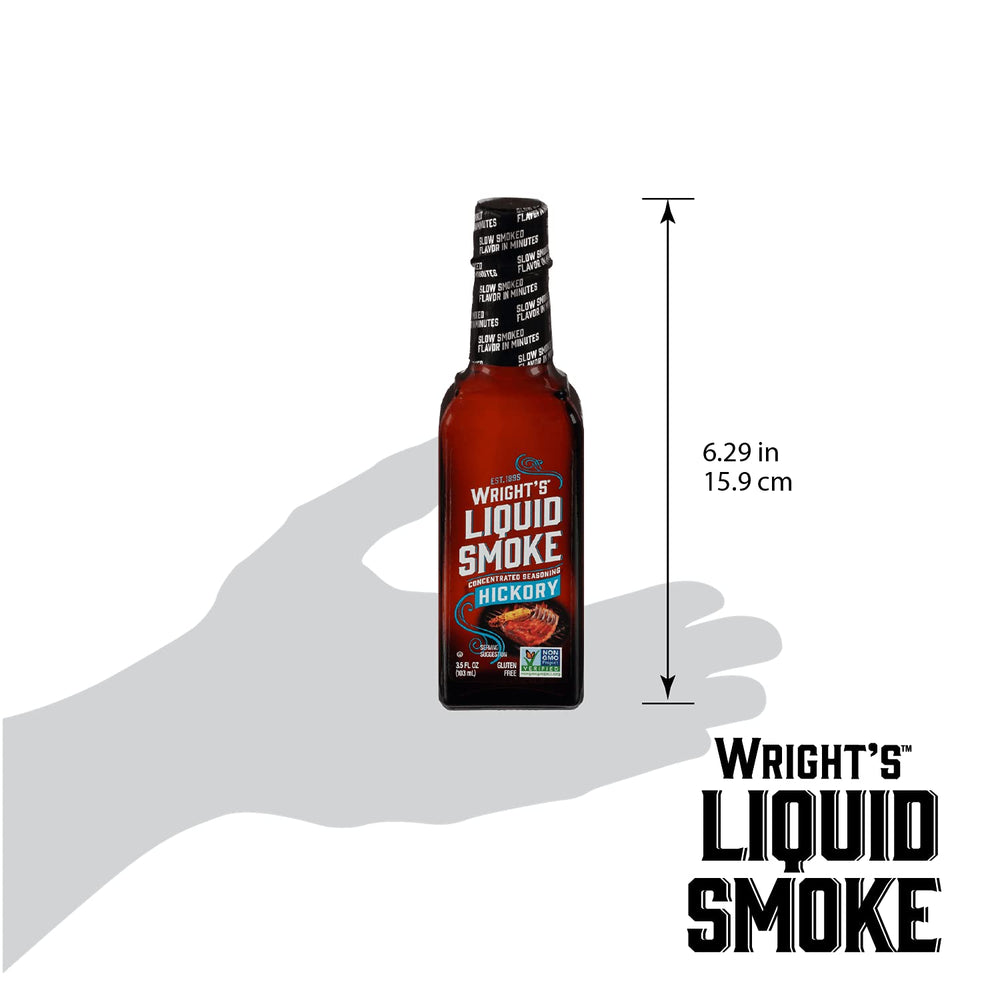 Wright's Liquid Smoke pouring into spoon to show concentrated texture and easy dosing benefit