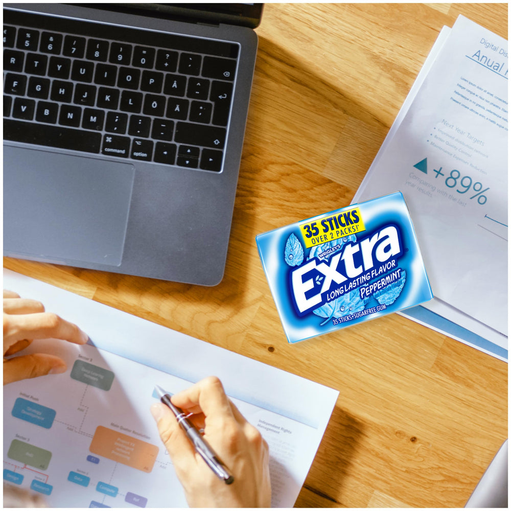 WRIGLEY'S EXTRA on an office desk illustrating fresh breath before meetings benefit