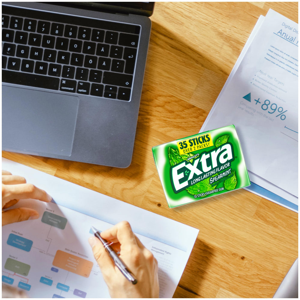 WRIGLEY'S EXTRA pack in hand illustrating easy use while commuting