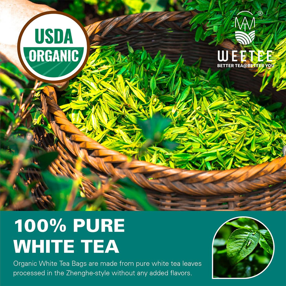 WT WEETEE tea bag steeping in a clear cup showing pale color and delicate aroma