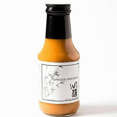 WU DRESSING front bottle view showing clear label and 10.7 fl oz size benefit