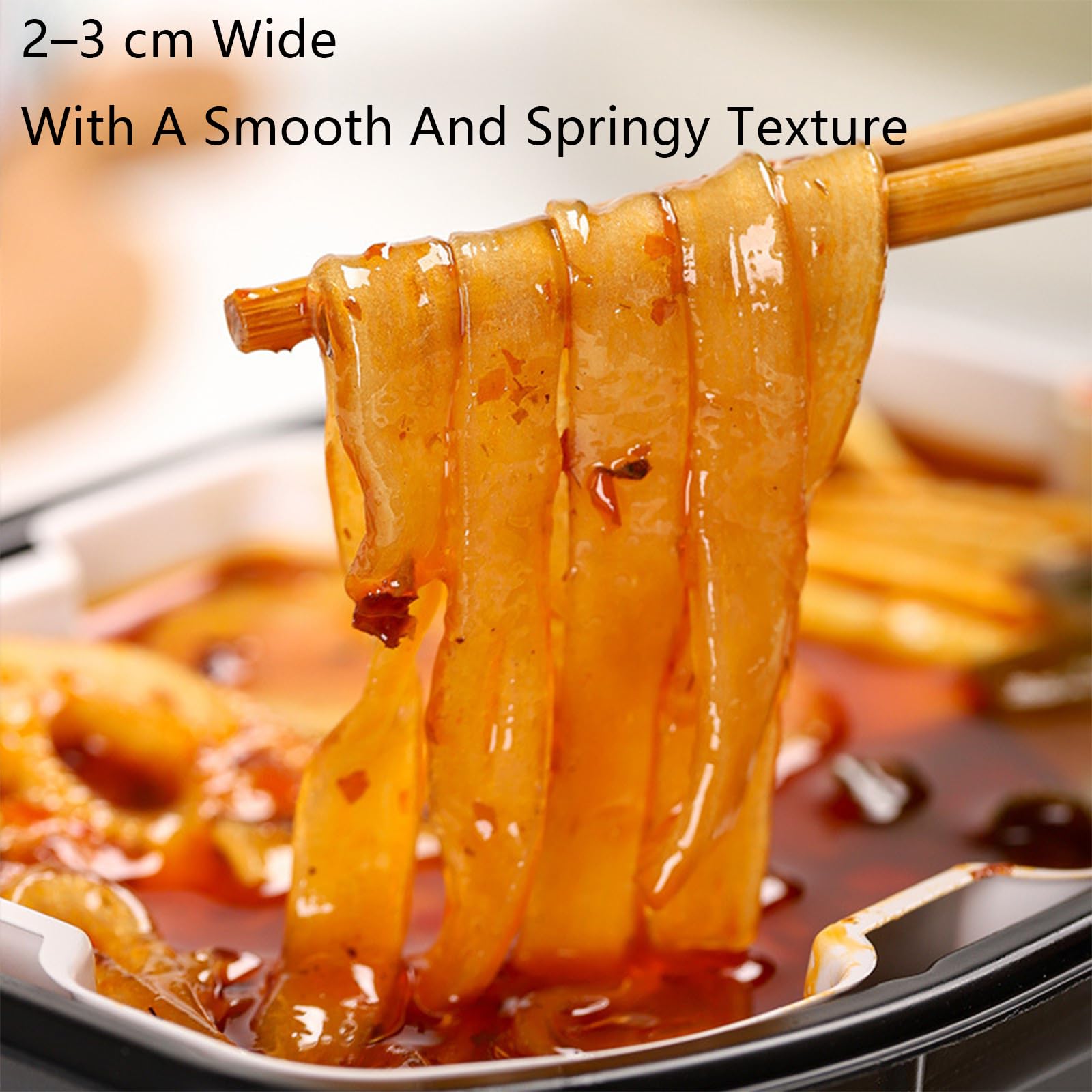 XIHUDE close-up of wide noodle texture highlighting chewy springy bite