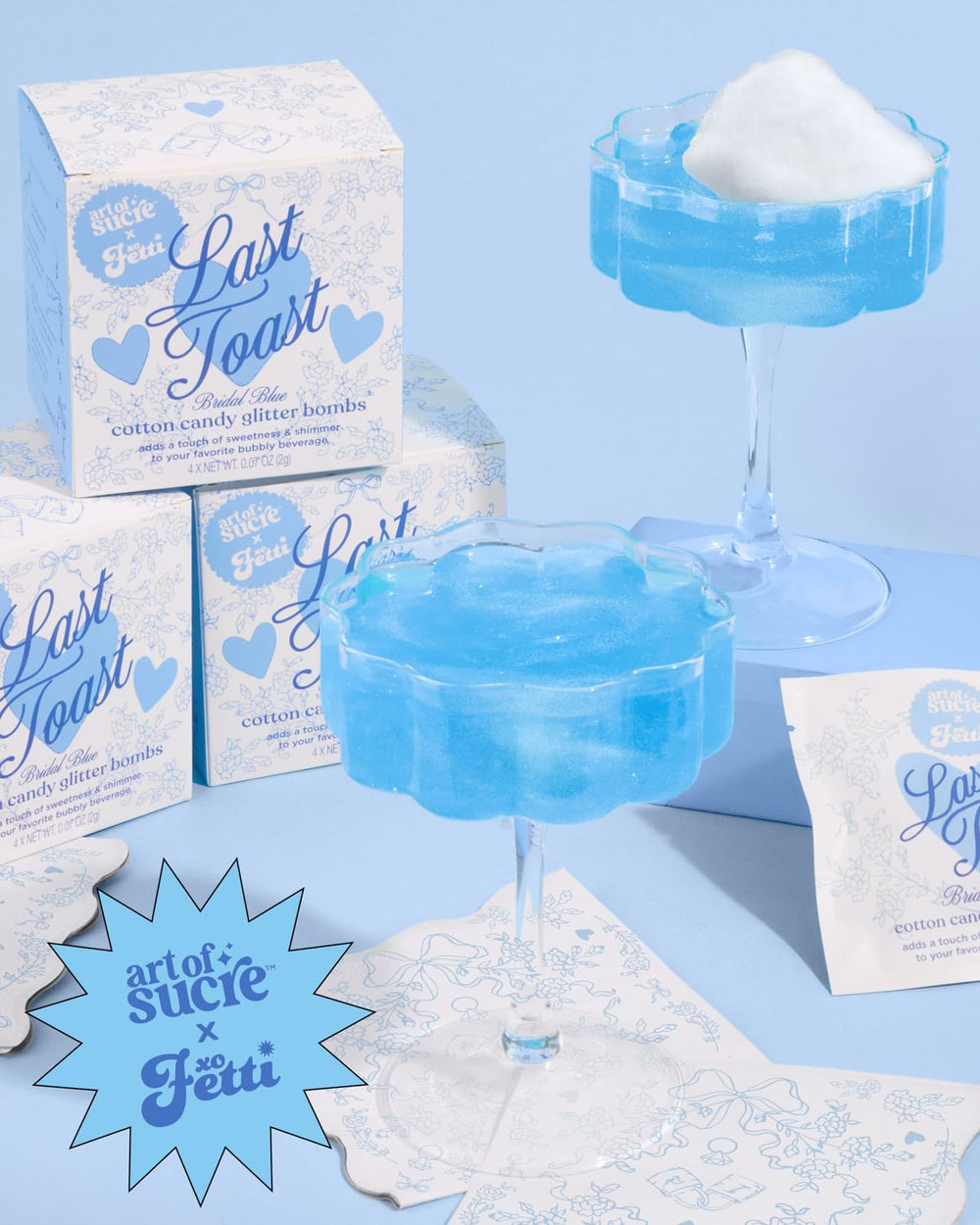 xo, Fetti bride and bridesmaids toasting with glittered drinks for celebration fun