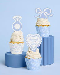 xo, Fetti wrapper detail around cupcake base for polished dessert presentation