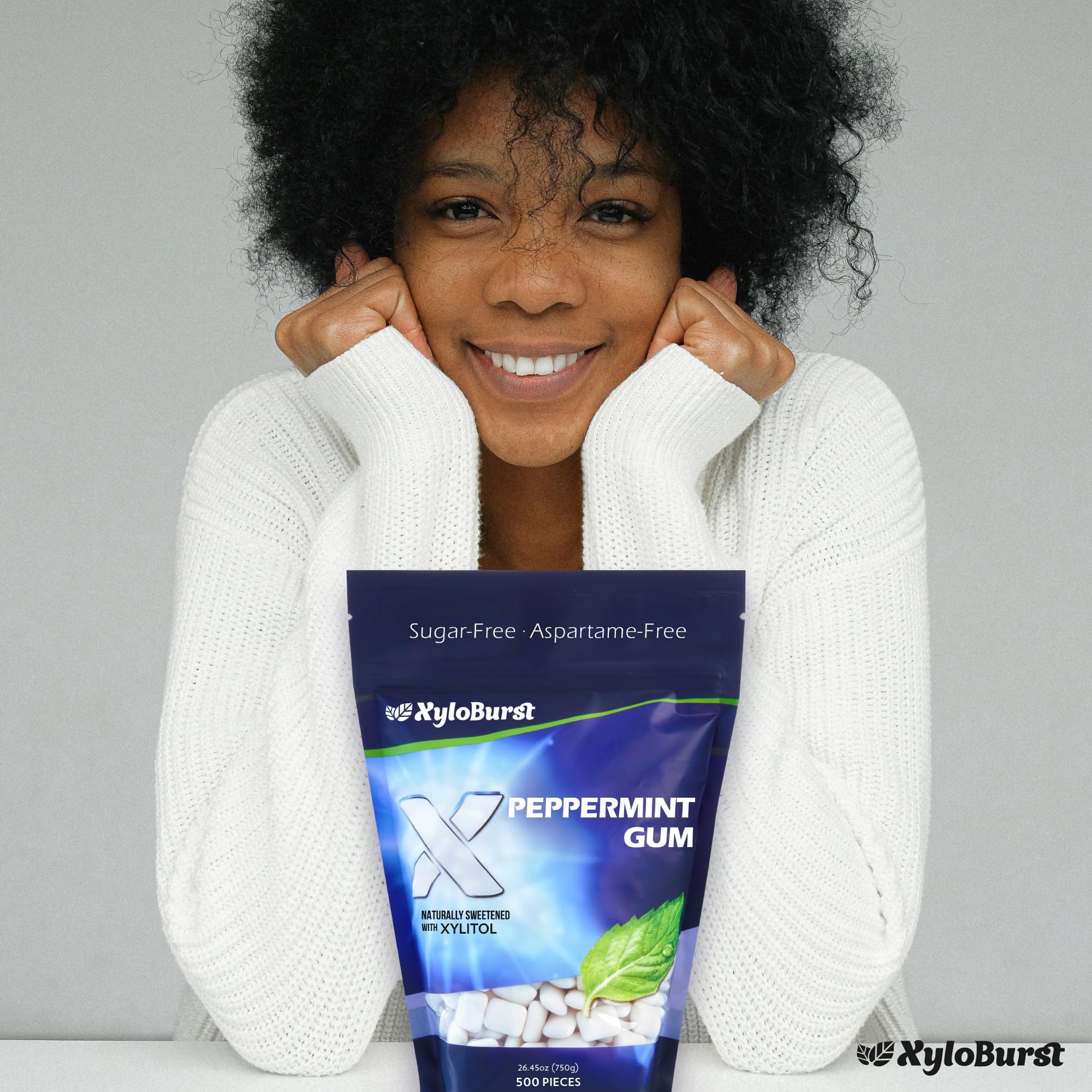 xyloburst peppermint bag on desk with notebook showing convenient sharing benefit