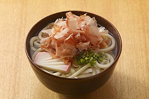 yamaki flakes held in hand for scale, illustrating lightweight thin shaves