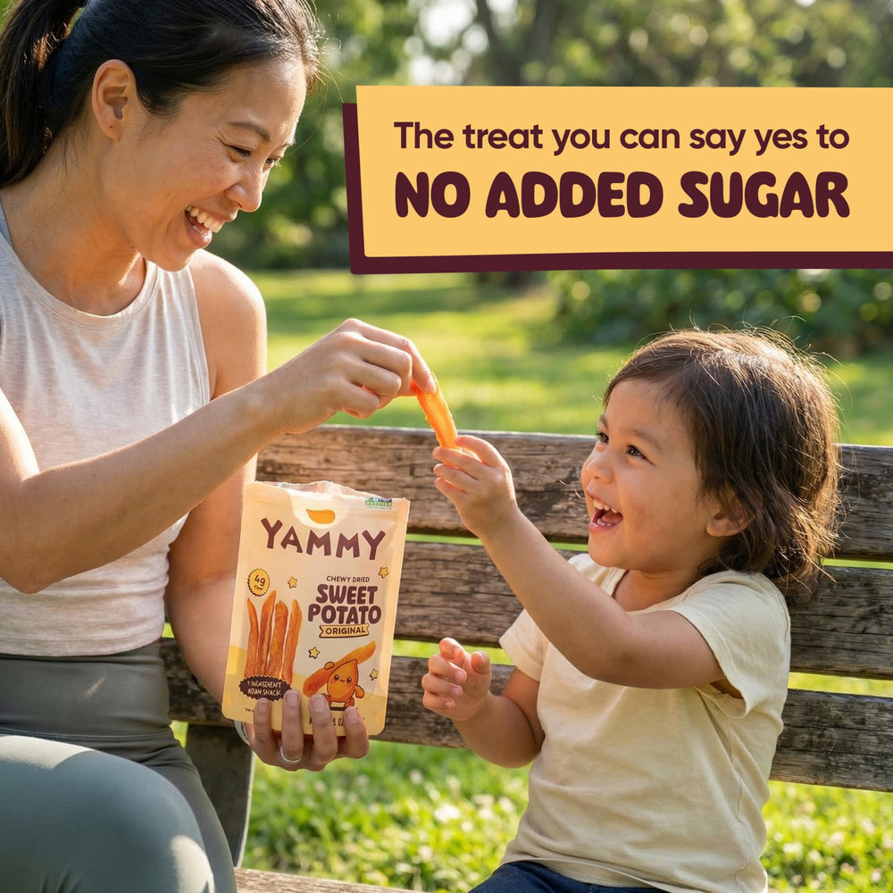 Yammy pouch in hand to demonstrate portable 2.5 oz serving size convenience