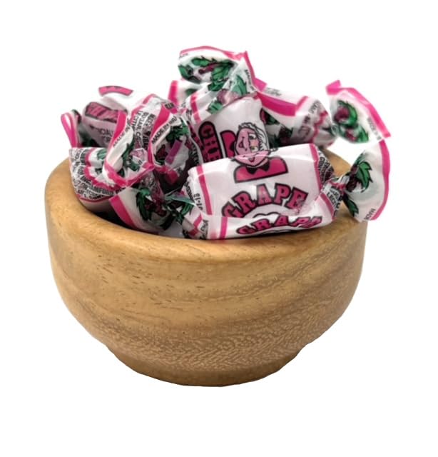 YANKEETRADERS close-up of a single grape chew unwrapped, highlighting soft texture and chew appeal