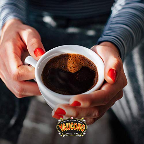 Open Yaucono jar with instant granules ready to dissolve for fast brewing