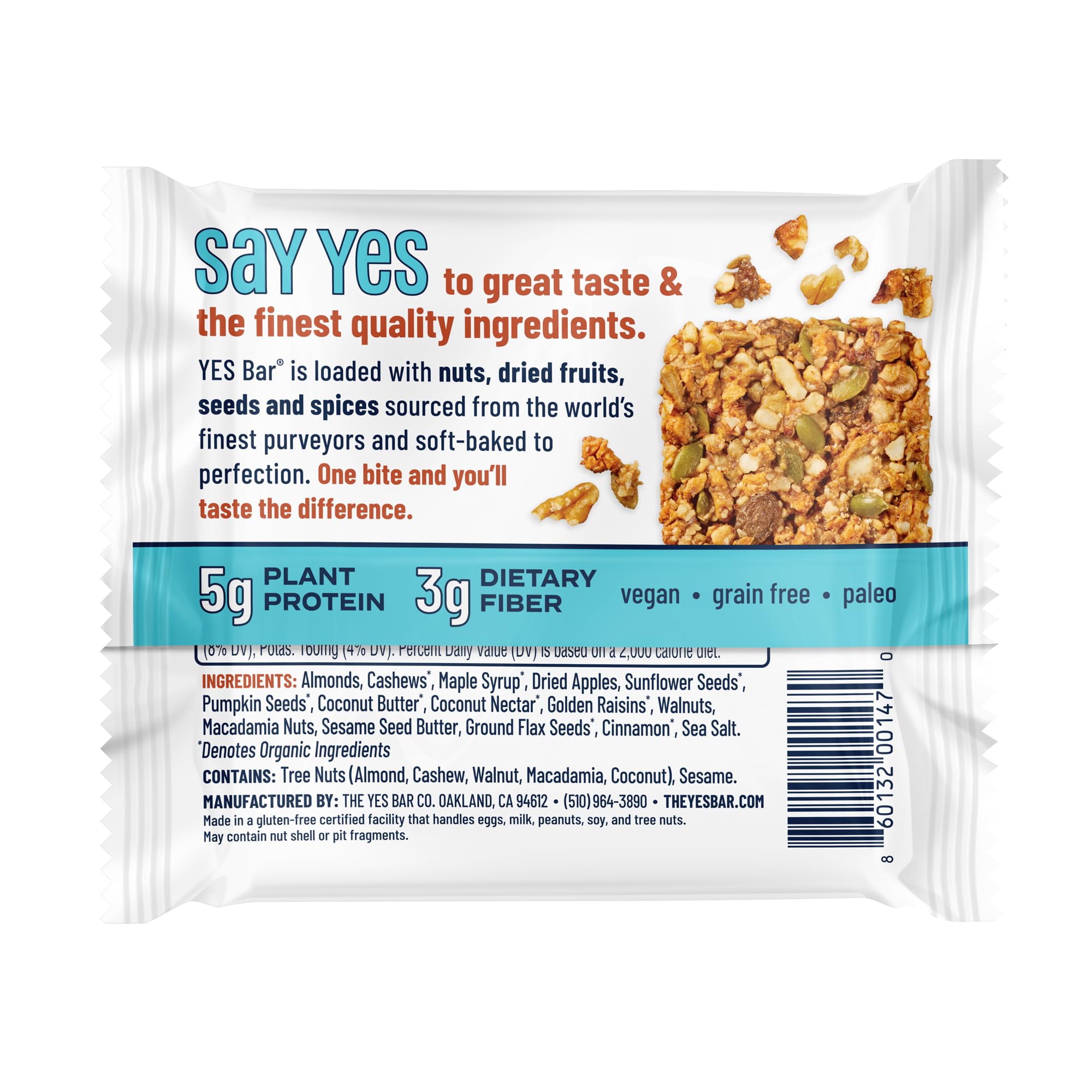 Hand holding a YES Bar apple cinnamon to show portable soft-chewy benefit