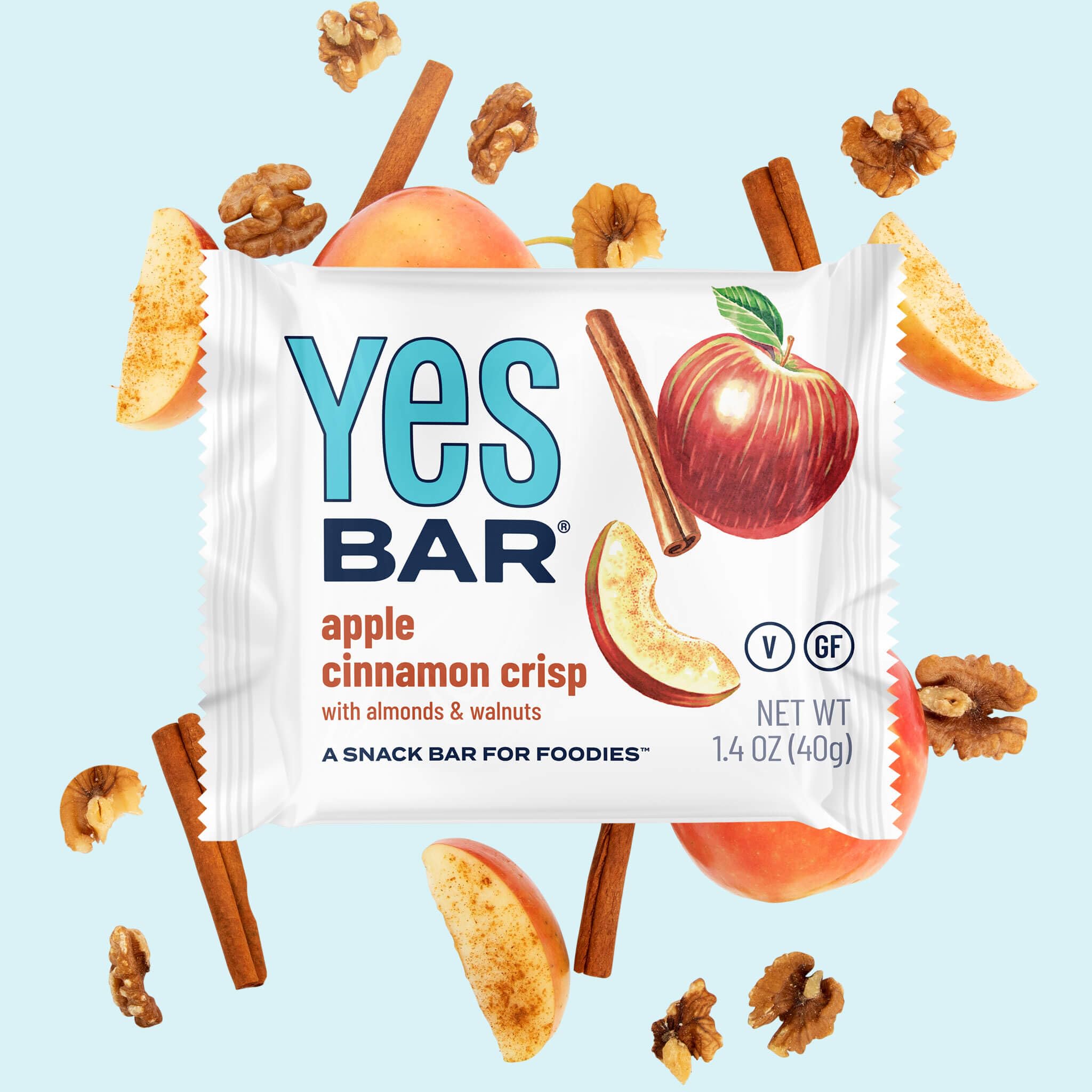 Assorted ingredients spread with YES Bar branding, highlighting real nuts and seeds